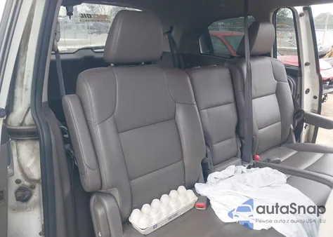 2014 Honda Odyssey Touring/Touring Elite z USA, uszkodzony, nr VIN 5FNRL5H92EB018703